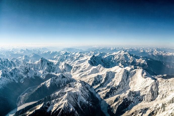 aerial view of snow covered mountains during daytime